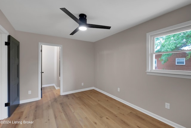 unfurnished bedroom featuring light hardwood / wood-style floors and ceiling fan