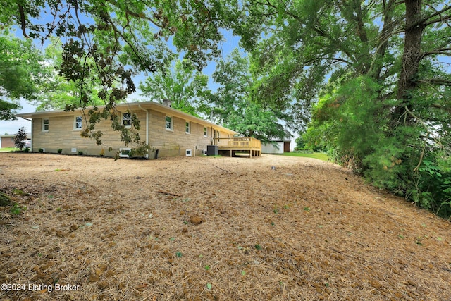 view of yard with a deck