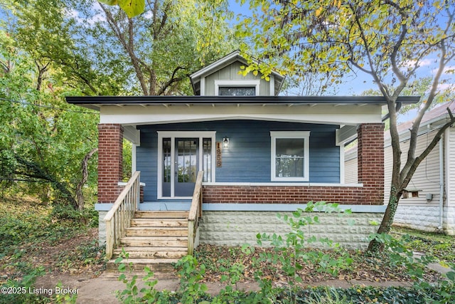 bungalow-style home with covered porch