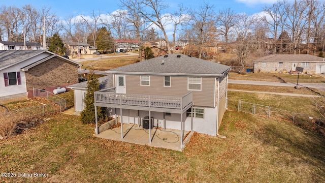 rear view of property with cooling unit, a patio, a lawn, and a fenced backyard