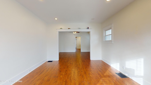 unfurnished room featuring wood-type flooring