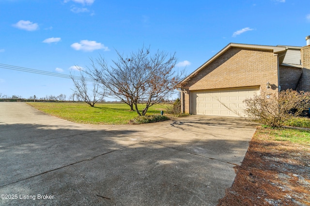 view of side of property featuring a garage