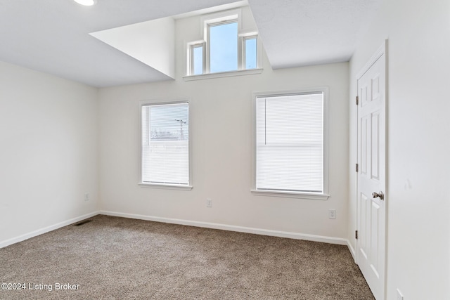 view of carpeted spare room