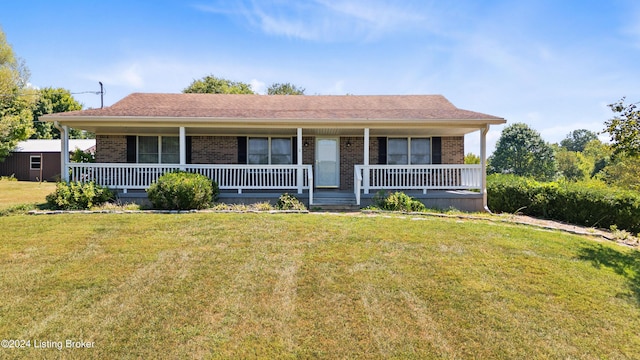 view of front of house with a front lawn and a porch