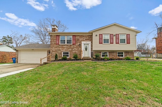 view of front of property with a garage and a front lawn