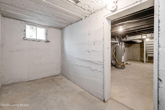 basement featuring water heater