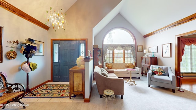 foyer with light colored carpet, a chandelier, and high vaulted ceiling