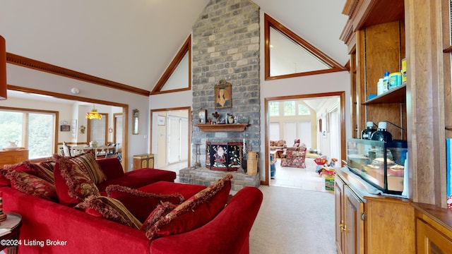 carpeted living room featuring a fireplace, high vaulted ceiling, and a wealth of natural light