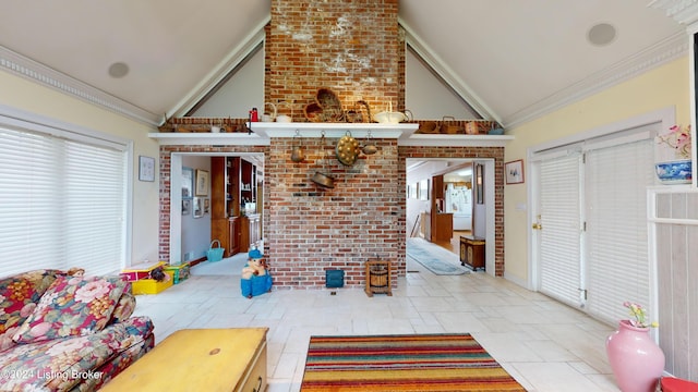 living room featuring brick wall, lofted ceiling, and ornamental molding