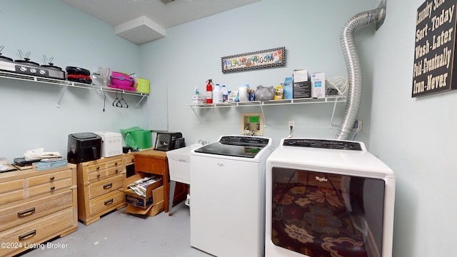 laundry area with separate washer and dryer