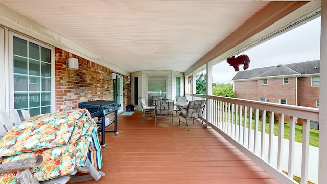 wooden deck with area for grilling