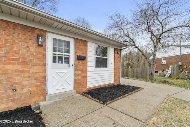 entrance to property with a patio area