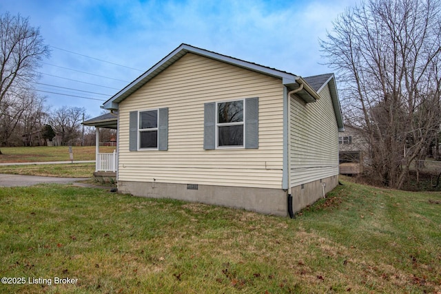 view of home's exterior featuring a lawn