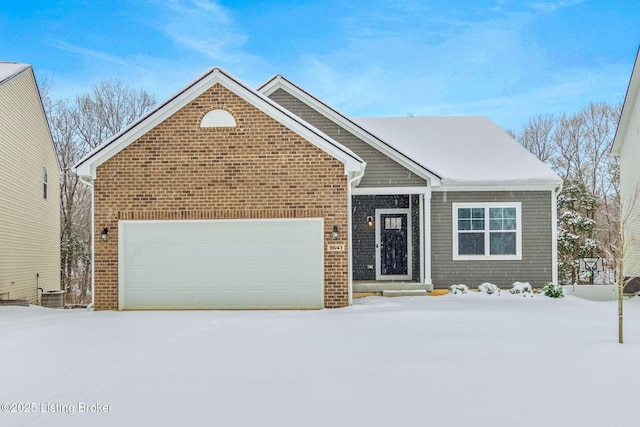 view of front of property featuring a garage