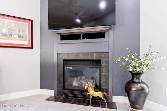 interior details with a tiled fireplace