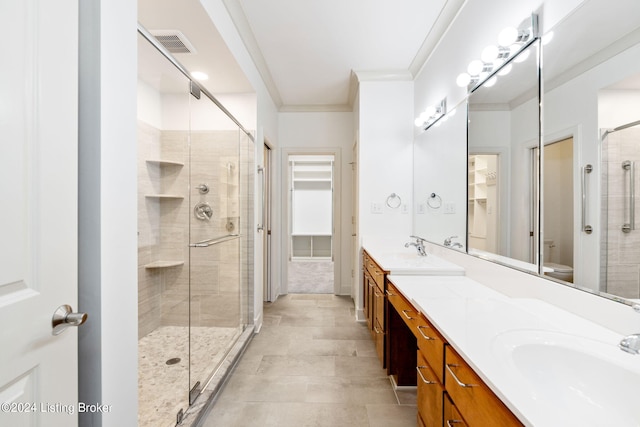 bathroom featuring vanity, toilet, walk in shower, and crown molding