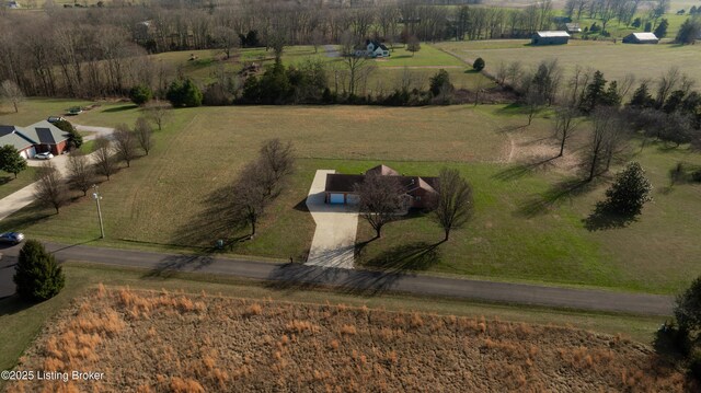 birds eye view of property featuring a rural view