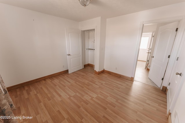 unfurnished bedroom featuring light hardwood / wood-style floors