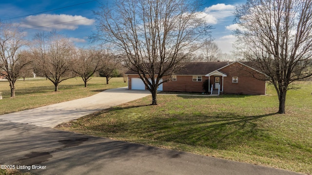 ranch-style home with a front lawn and a garage