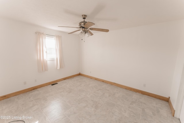 unfurnished room featuring ceiling fan