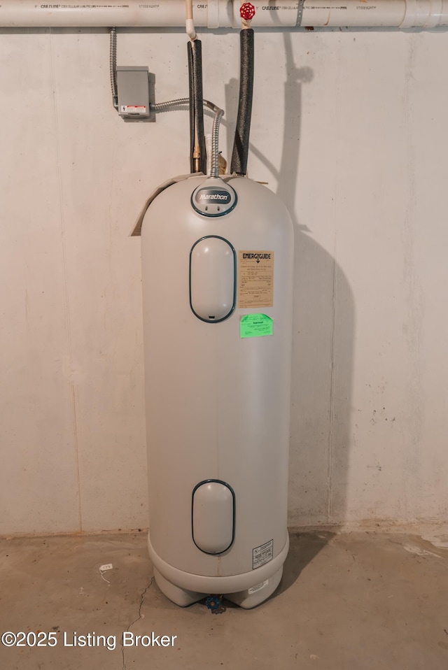 utility room with electric water heater