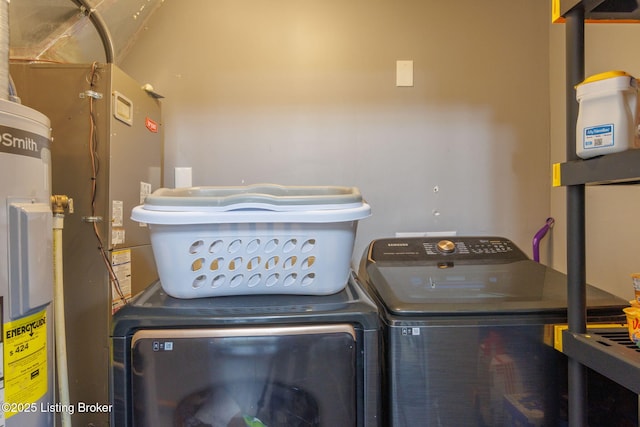 washroom featuring independent washer and dryer