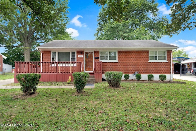 ranch-style home with a front lawn