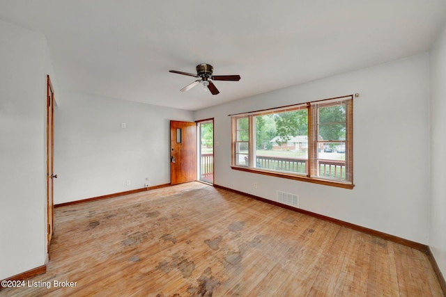 unfurnished room featuring ceiling fan and light hardwood / wood-style floors