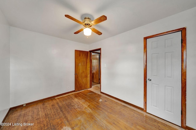 unfurnished room with ceiling fan and light hardwood / wood-style floors