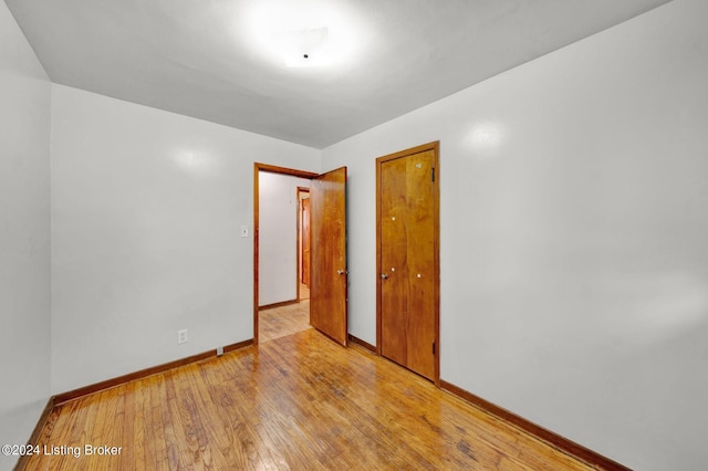 empty room with light wood-type flooring