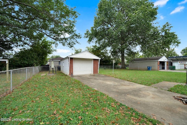 garage with a lawn