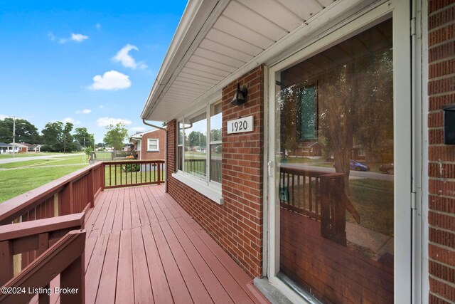 deck featuring a yard