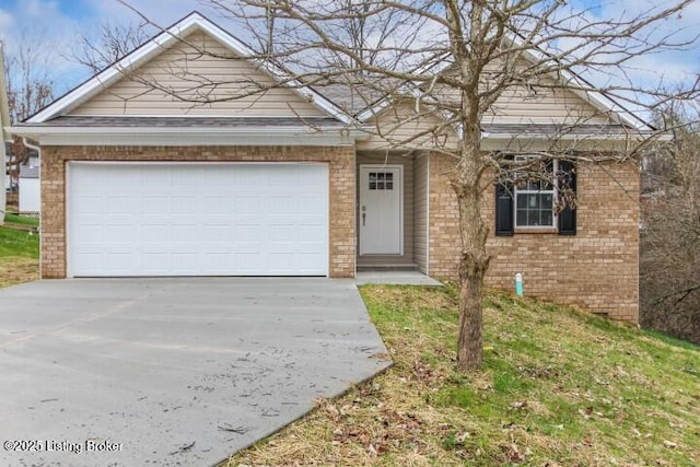 view of front of property featuring a garage