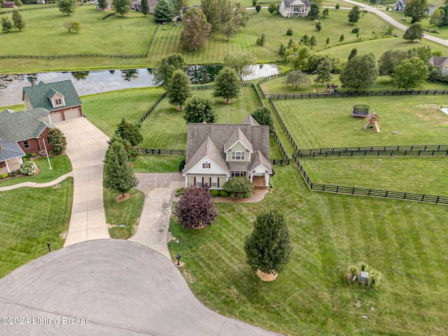 aerial view featuring a rural view and a water view