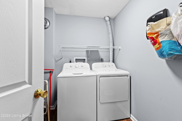 washroom featuring independent washer and dryer