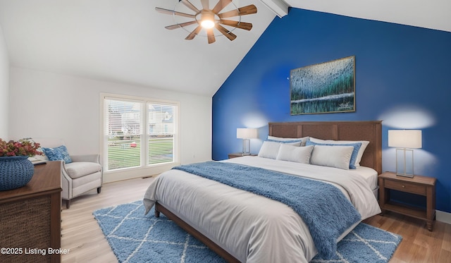 bedroom featuring lofted ceiling with beams, ceiling fan, and light hardwood / wood-style flooring