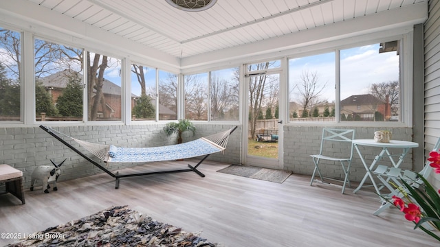 sunroom / solarium featuring plenty of natural light