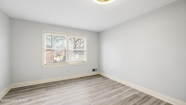 empty room featuring light hardwood / wood-style flooring