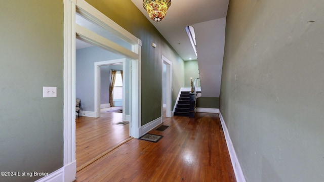 corridor featuring hardwood / wood-style flooring