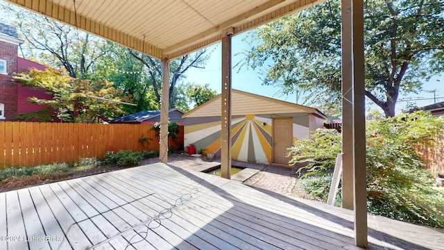 deck with a storage shed