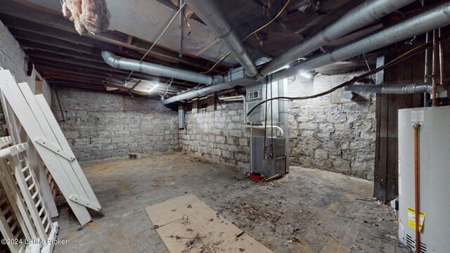 basement with gas water heater and heating unit