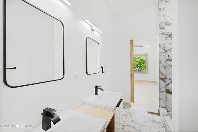 bathroom with vanity and walk in shower