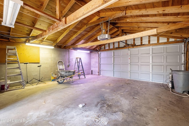 garage featuring a garage door opener