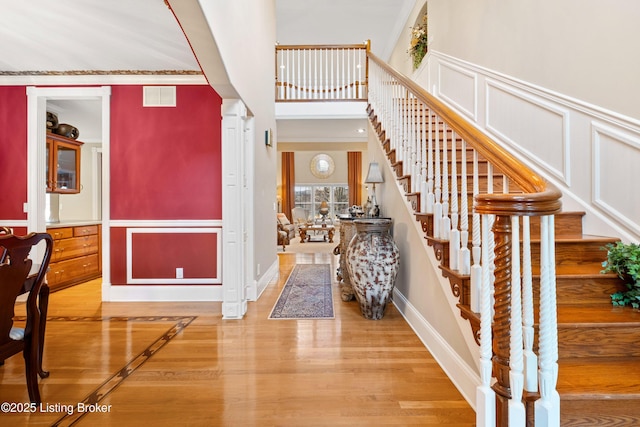 foyer entrance featuring hardwood / wood-style floors