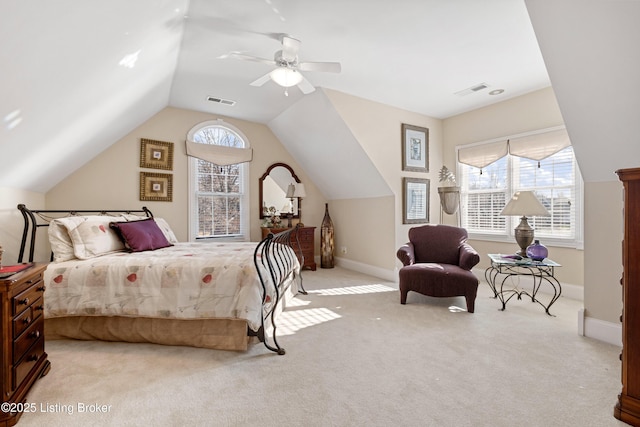 carpeted bedroom featuring ceiling fan and lofted ceiling