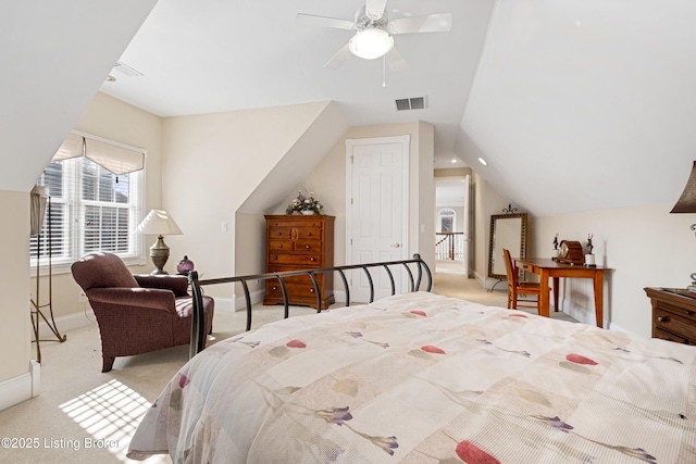 bedroom featuring ceiling fan, light colored carpet, and lofted ceiling