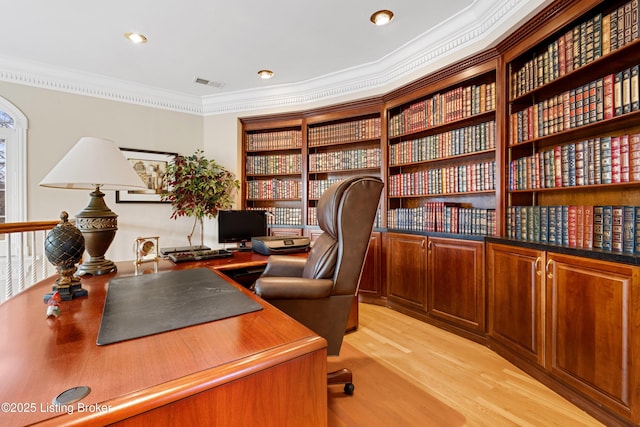 office space featuring ornamental molding and light wood-type flooring