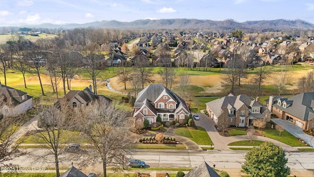 drone / aerial view featuring a mountain view