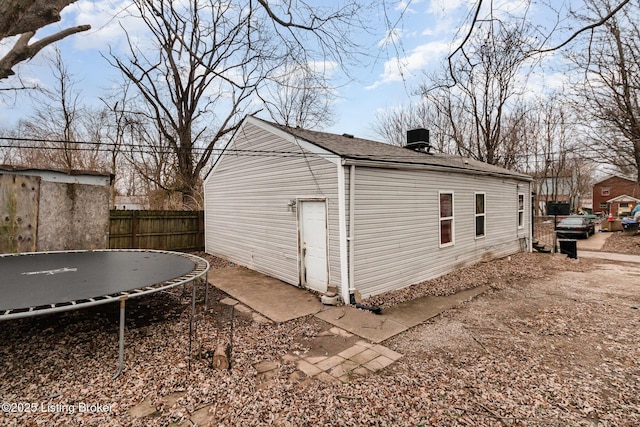 view of home's exterior featuring a trampoline