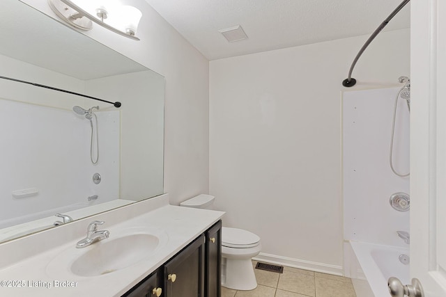 full bathroom with tile patterned flooring, a textured ceiling,  shower combination, toilet, and vanity